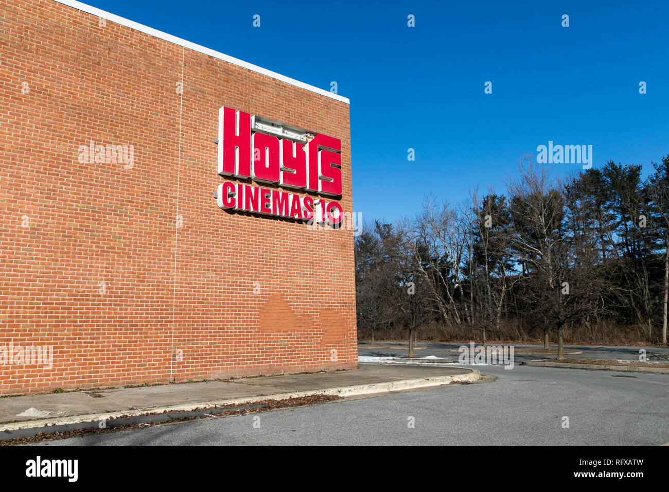 A logo sign outside of an abandoned Hoyts Group movie theater in