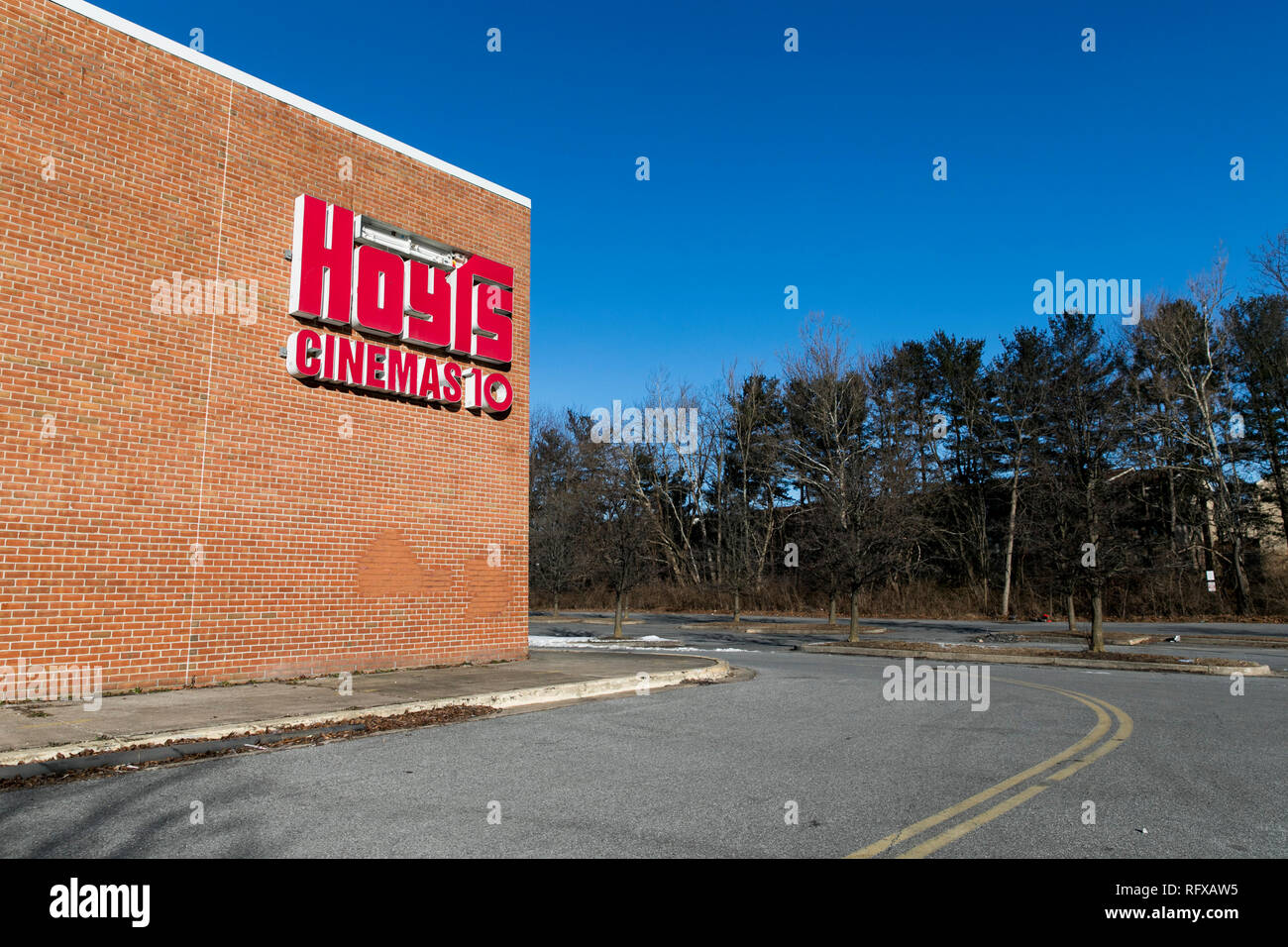 A logo sign outside of an abandoned Hoyts Group movie theater in