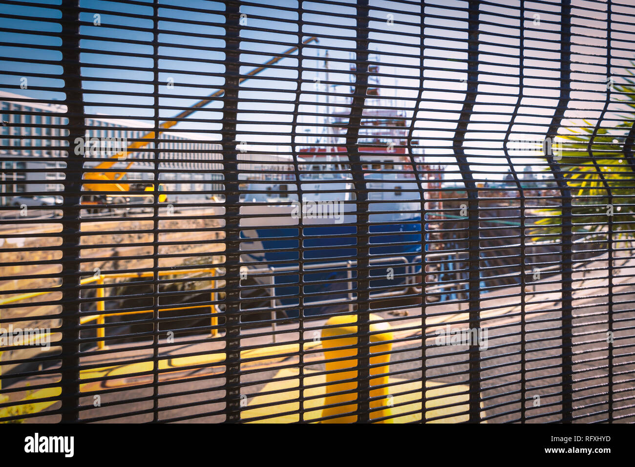 Ship in a dry dock behind the fence in Cape Town Stock Photo Alamy