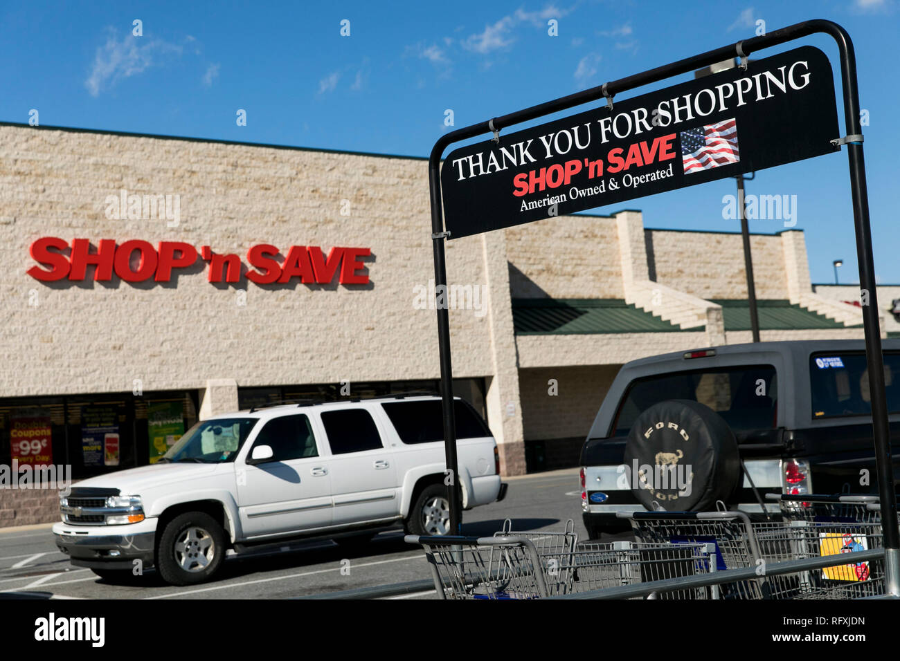 A logo sign outside of a SHOP 'n SAVE retail grocery store location in