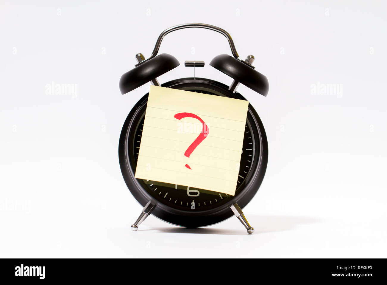 Question mark and alarm clock on the label Stock Photo Alamy