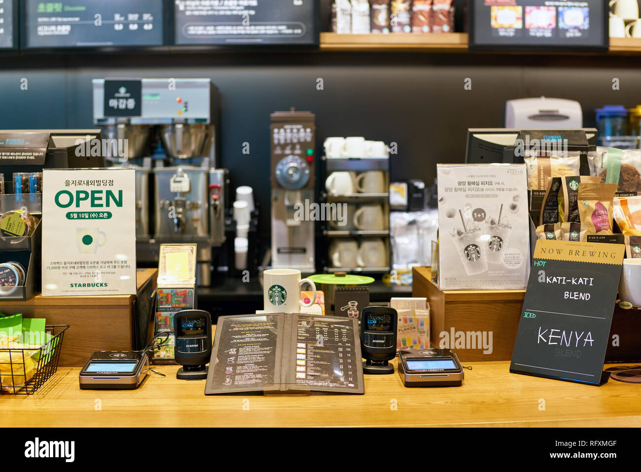 SEOUL, SOUTH KOREA - CIRCA MAY, 2017: inside Starbucks coffee shop in Seoul. Starbucks Corporation is an American coffee company and coffeehouse chain Stock Photo