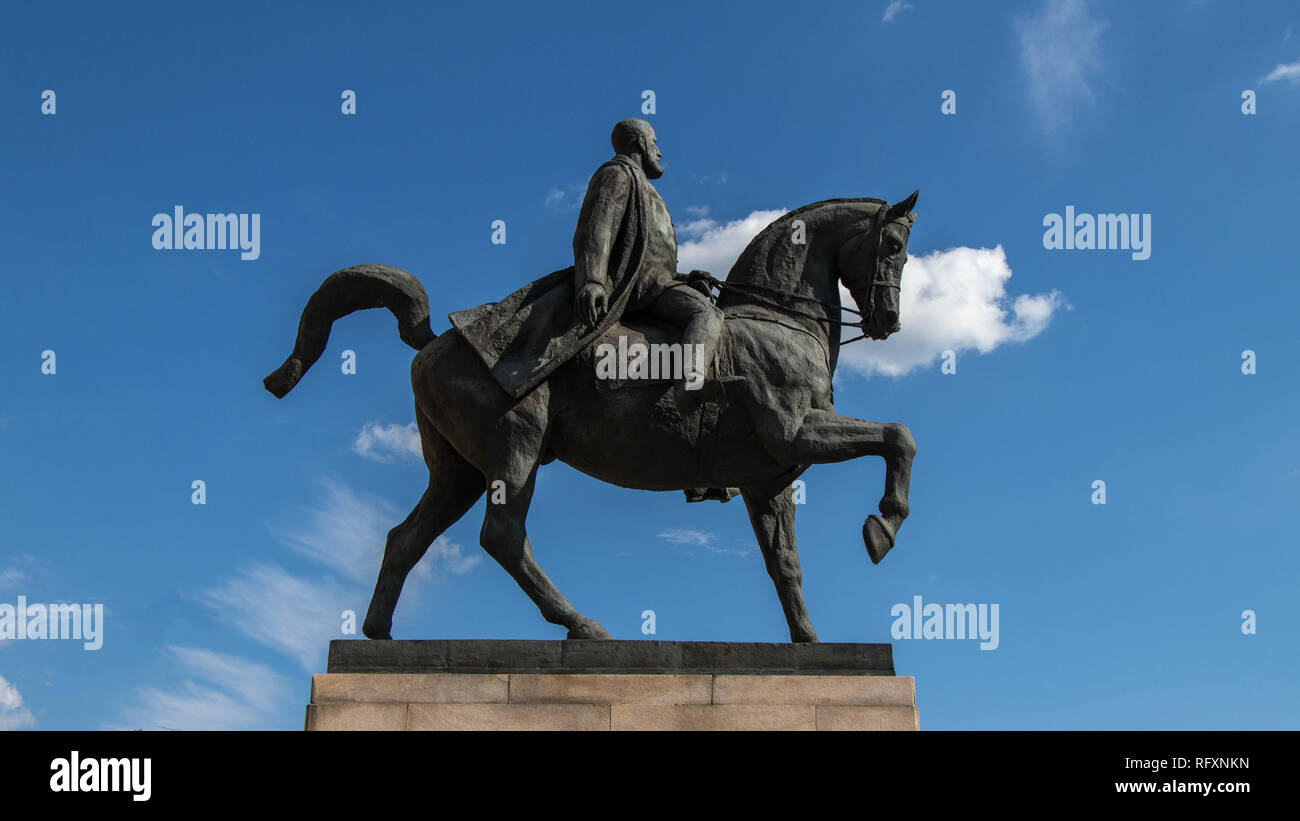 A man on horse black statue Stock Photo