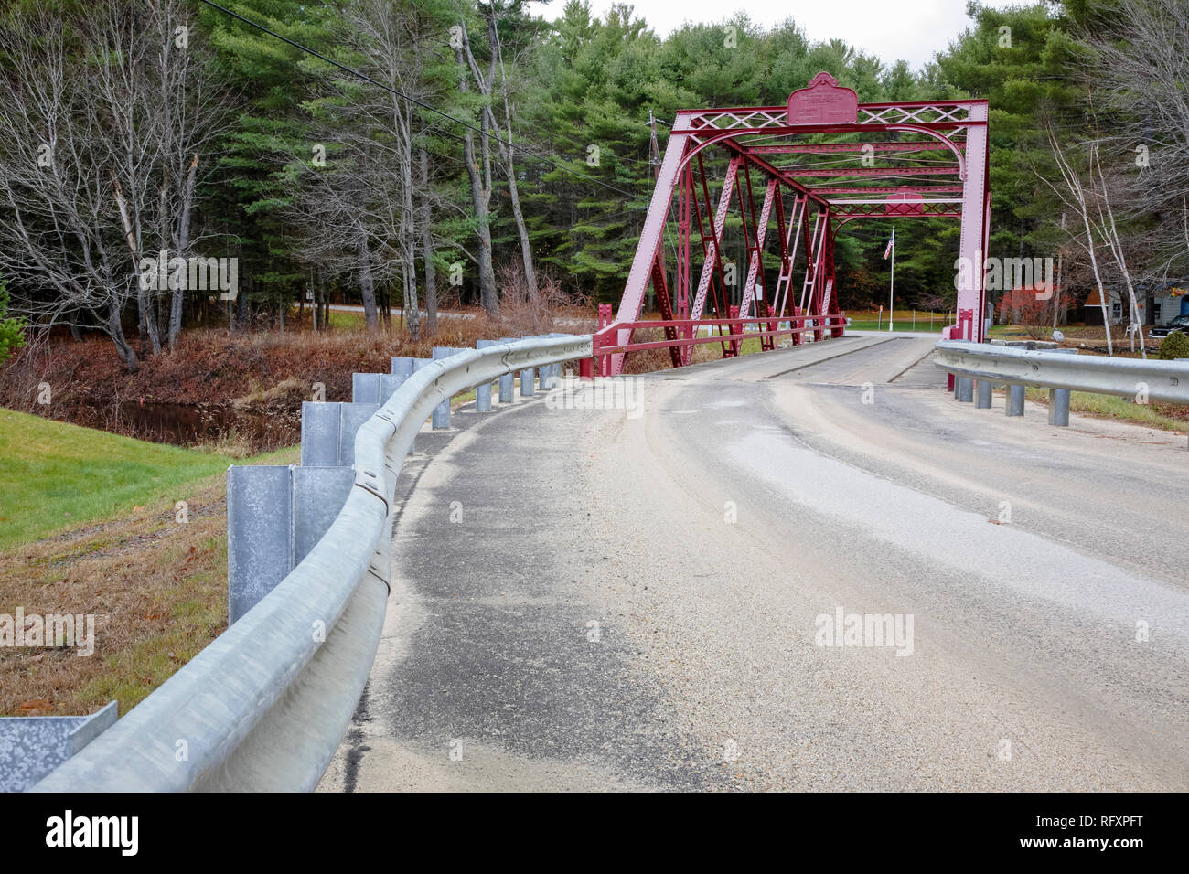 Ryefield Bridge in Otisfield, Maine. This is the last remaining suspension bridge of its style in the State of Maine and it is listed on the National  Stock Photo