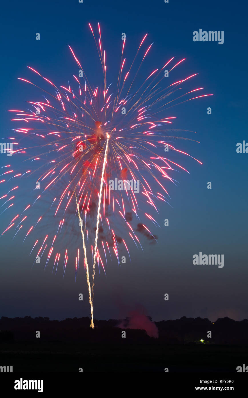 Fourth of July fireworks over small town America. Peru, Illinois, USA