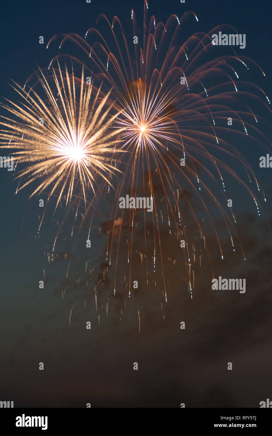 Fourth of July fireworks over small town America. Peru, Illinois, USA