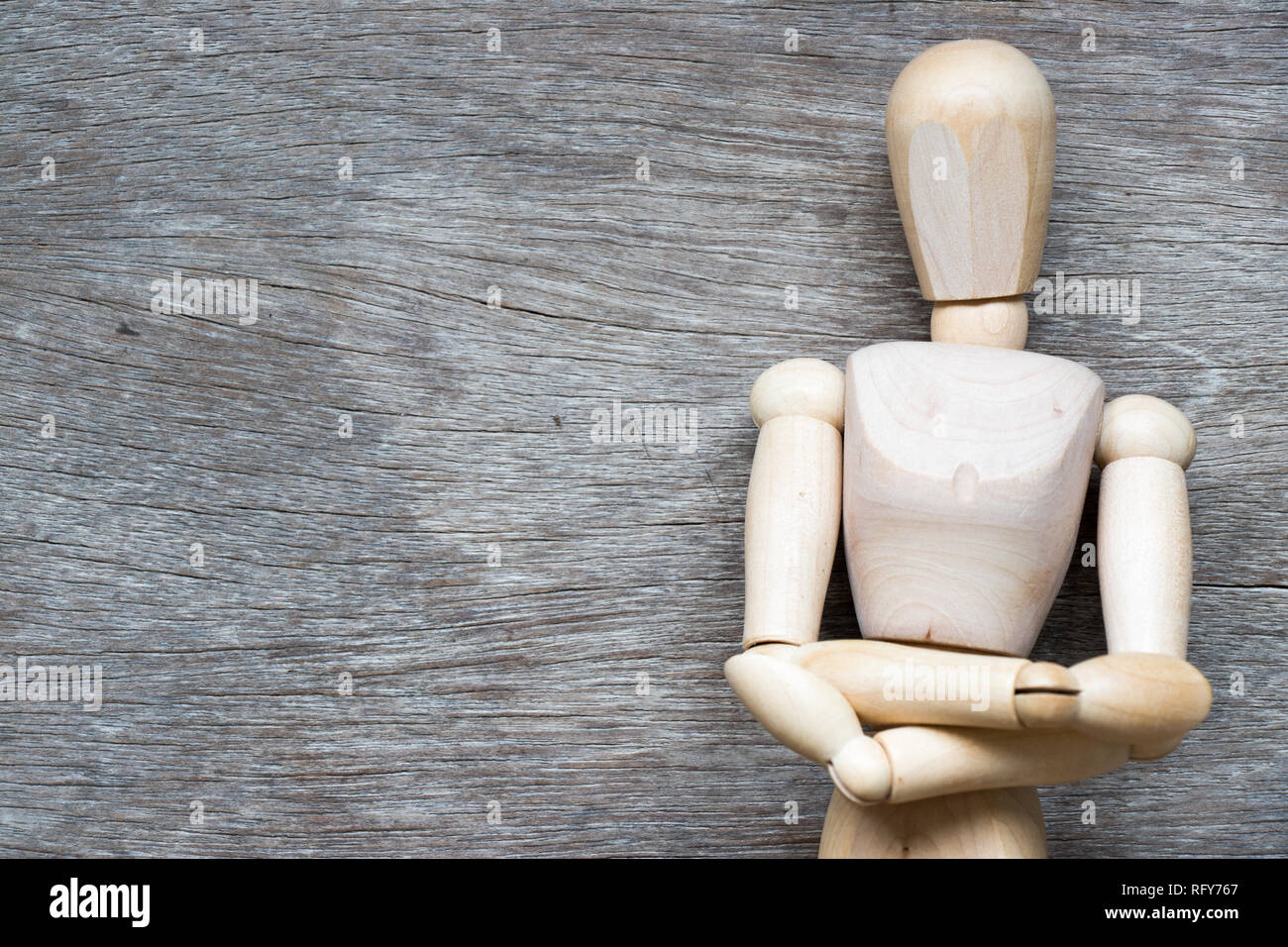 A wooden mannequin in a ballet pose, on it's base, on a white surface Stock  Photo - Alamy