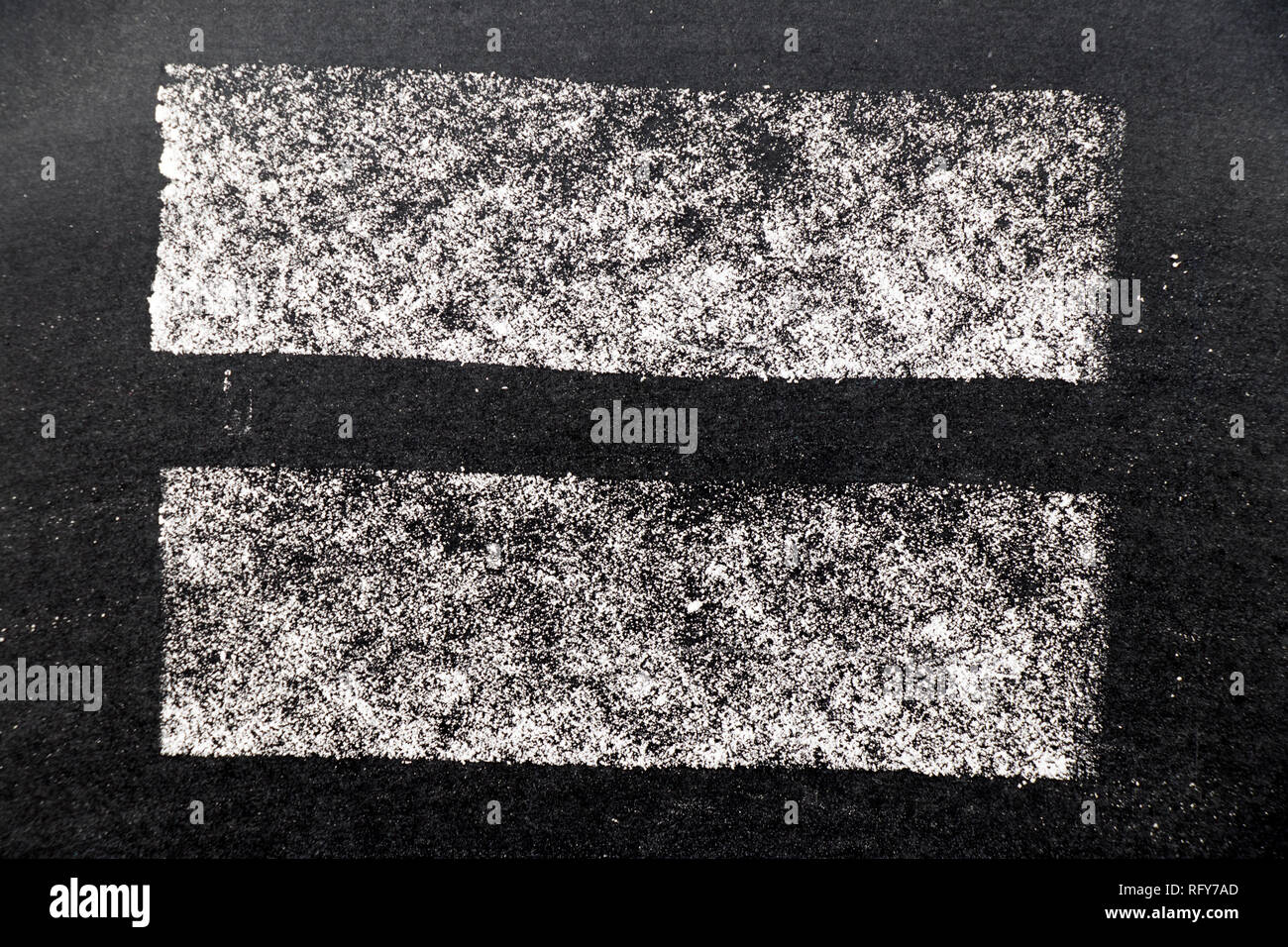 White chalk paint texture on black board background for decoration or