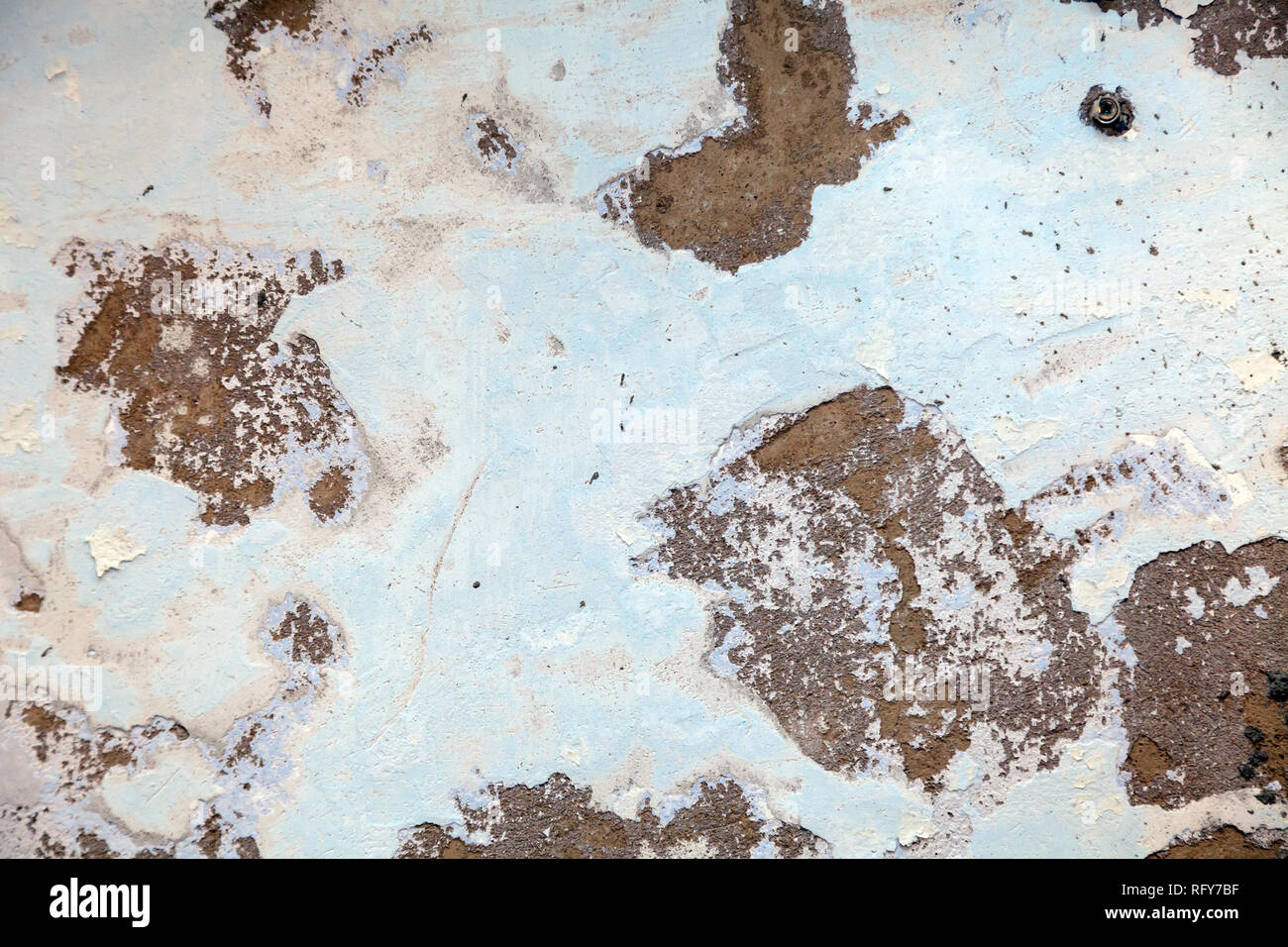 Closeup aged battered shabby wall, copyspace, free space for inscriptions, lettering, textured background. Concept repair, vintage, restructuring, ret Stock Photo