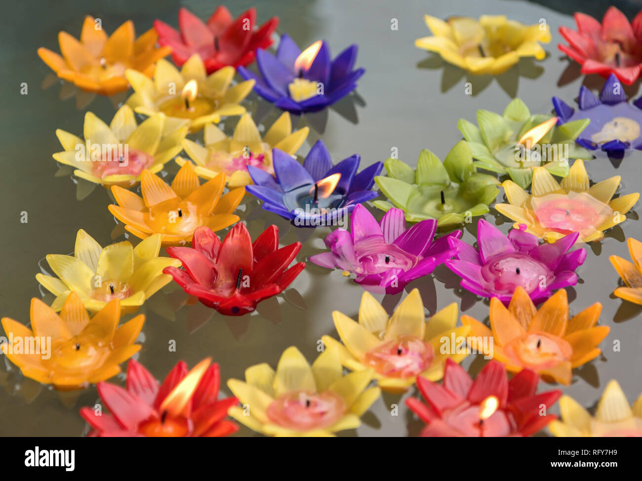 The colorful candles floating on the water Stock Photo Alamy