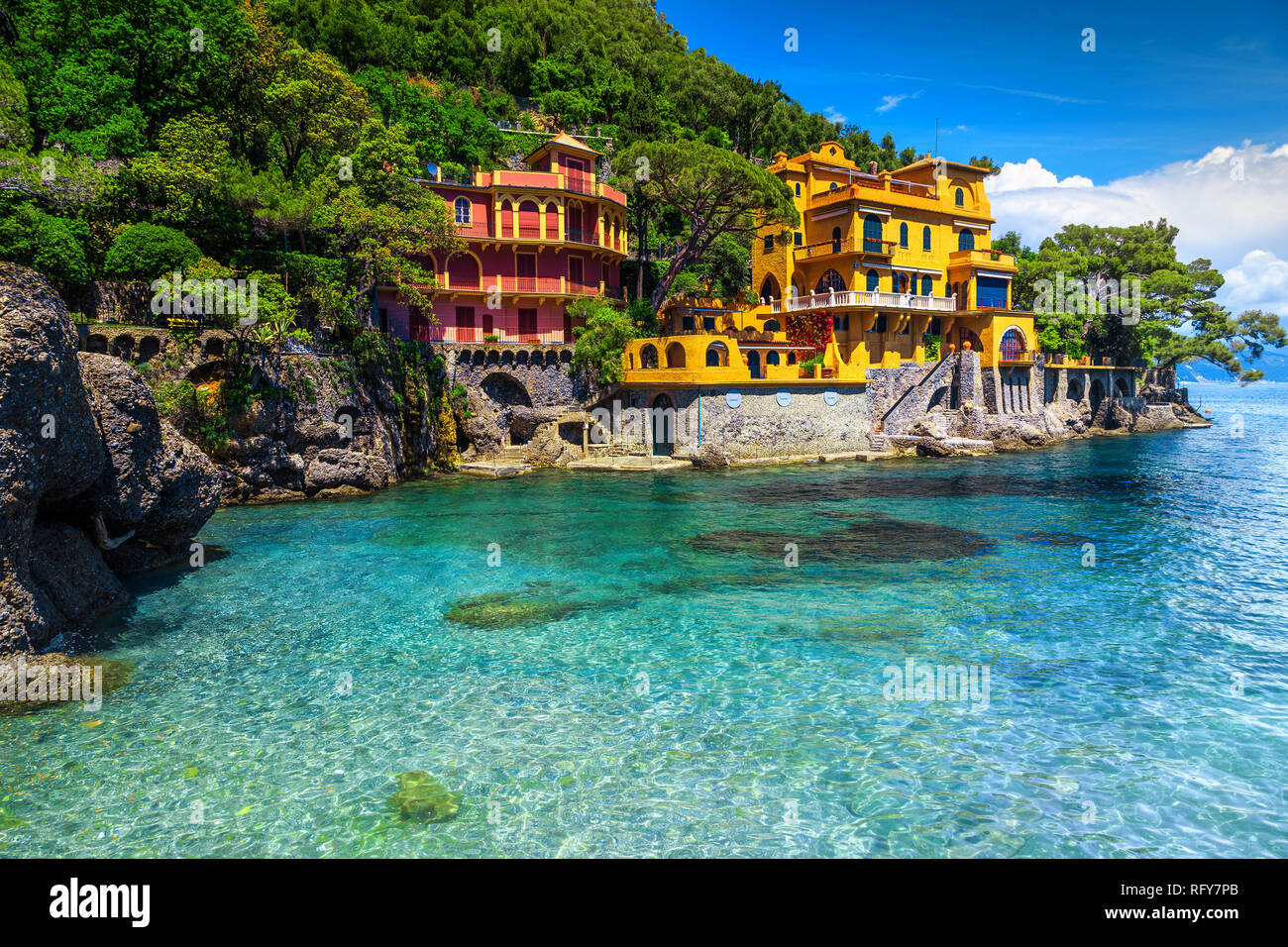 Beautiful summer holiday destination, colorful luxury seaside villas and stunning beach with clean turquoise water, Portofino, Liguria, Italy, Europe Stock Photo