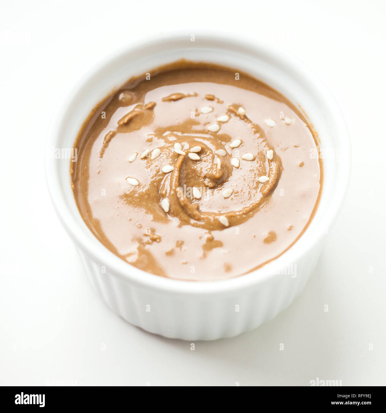 Tahini sesame seed paste with seeds Stock Photo Alamy