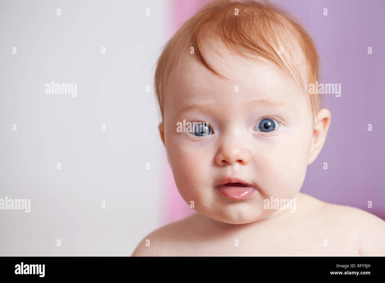 Cute ginger hair baby with blue eyes Stock Photo - Alamy