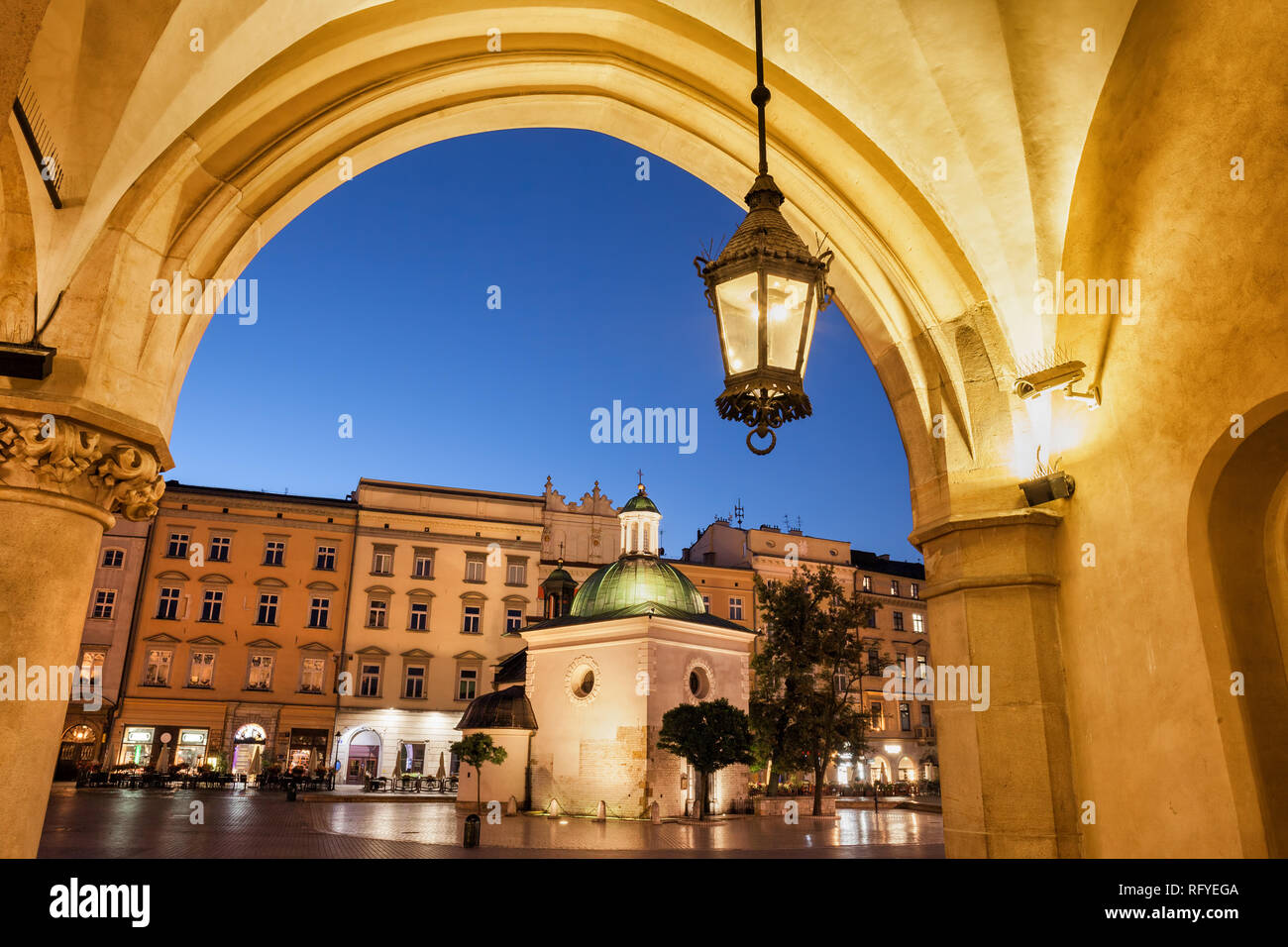 City of Krakow by night in Poland, Ranaissance arch of the Cloth Hall