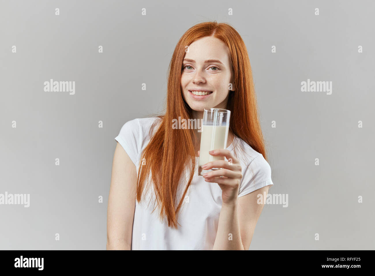 positive good looking girl drinking milk Stock Photo - Alamy positive good looking girl drinking milk Stock Photo - Alamy