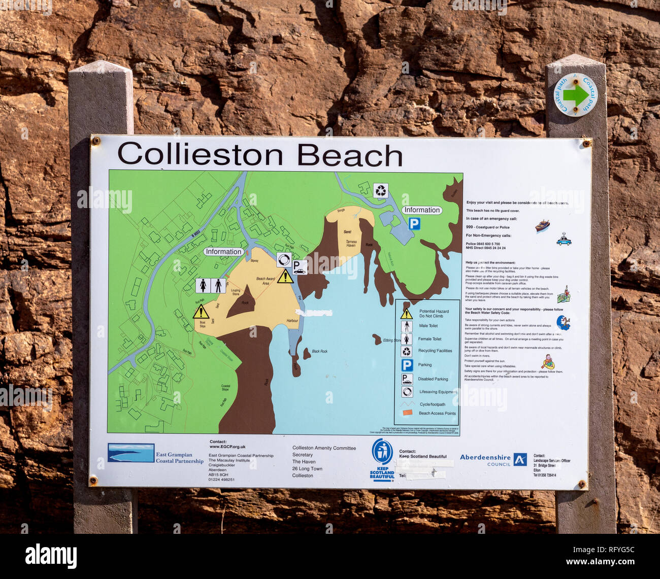 Tourist map and information board on the beach at Collieston, Aberdeenshire, Scotland, UKL Stock