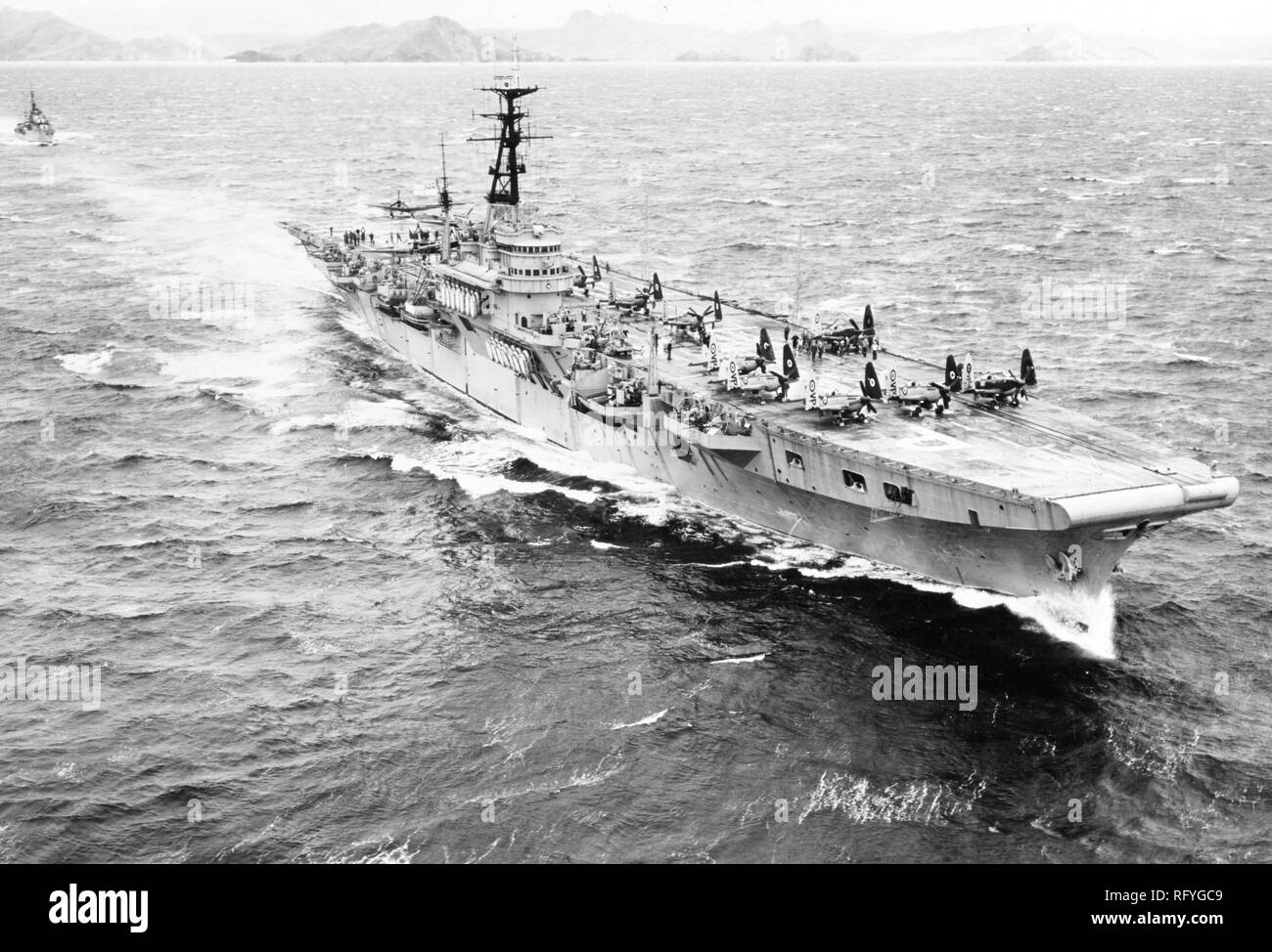 HMS Triumph Royal Navy Colossus-class light fleet aircraft carrier. She served in the Korean War Stock Photo