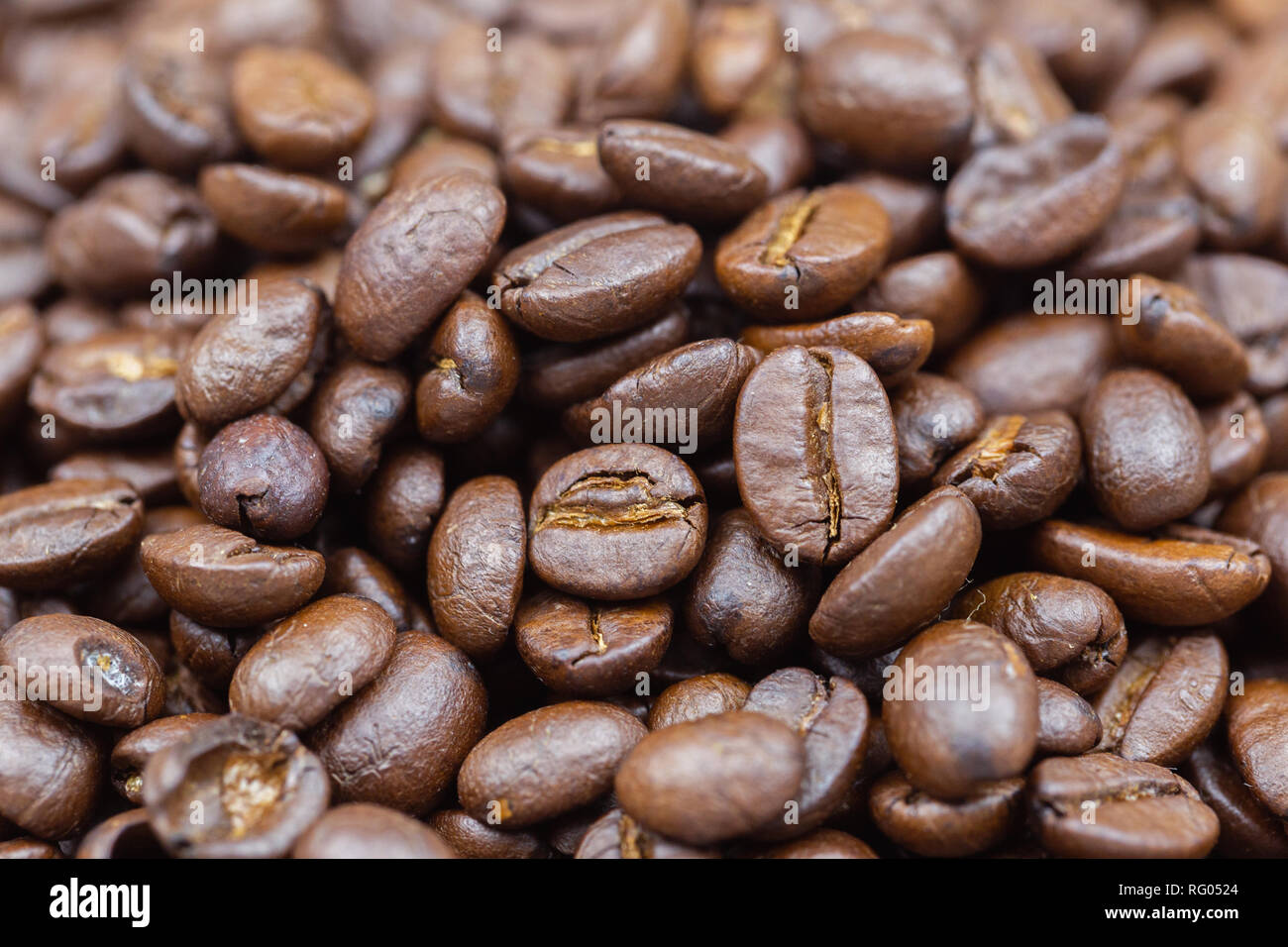 Brown roasted coffee beans texture background for food and drink or ...