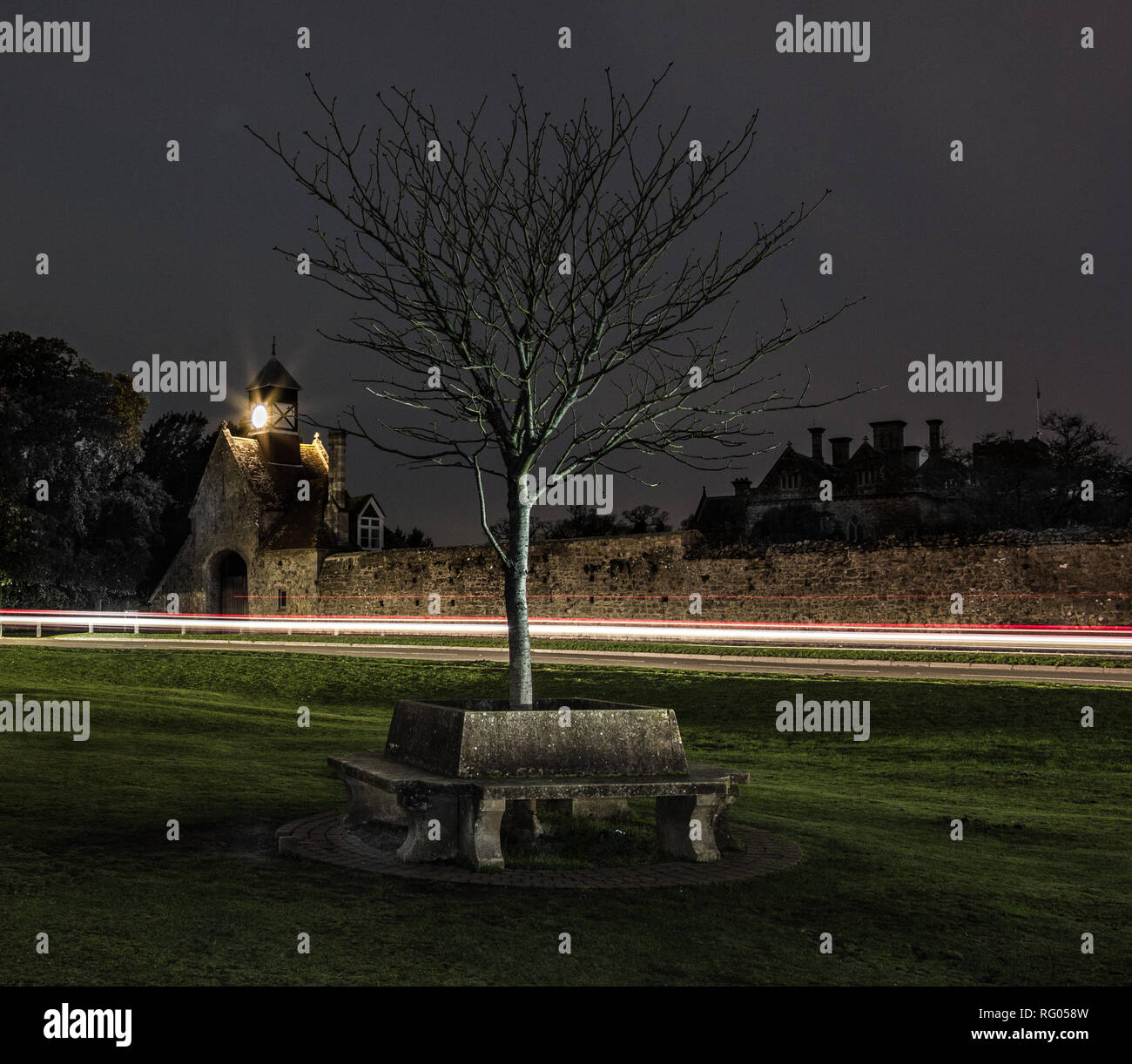 Ancient stone built gatehouse Tudor style clock tower Beaulieu