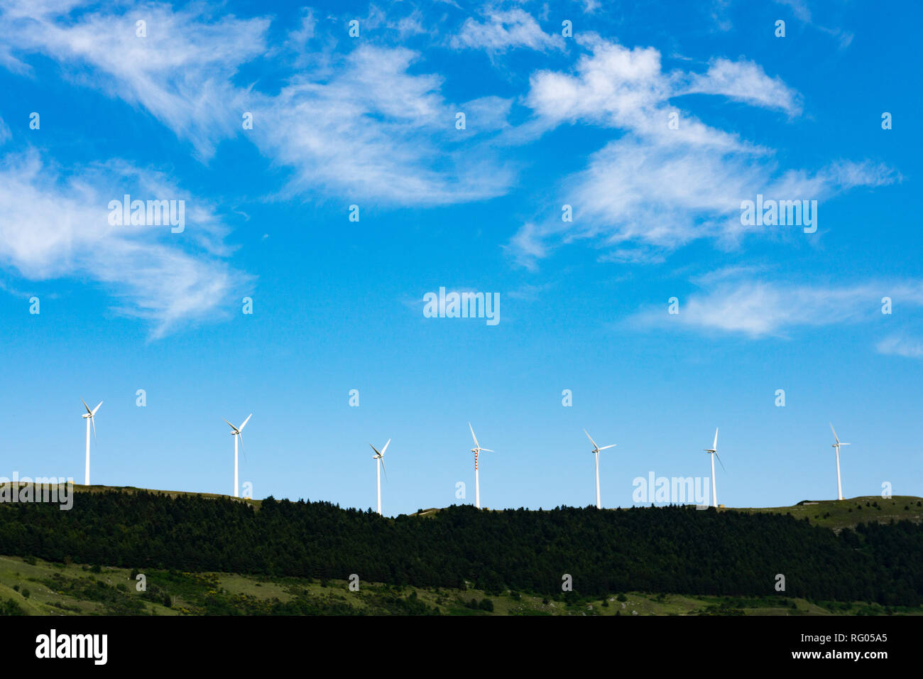 Wind turbines farm. Alternative energy source in Italy Stock Photo