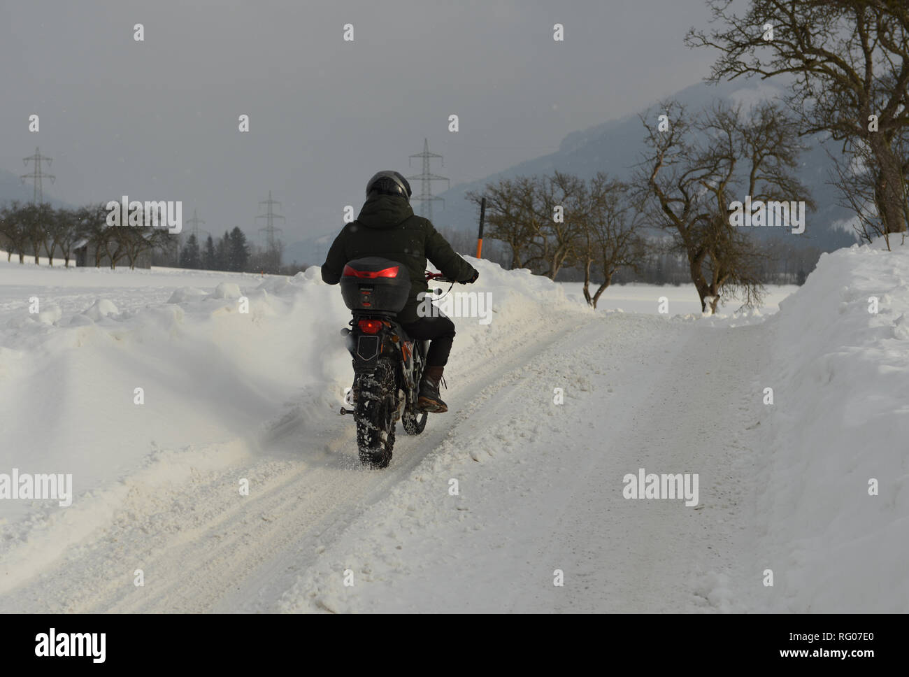 MOTORBIKE WITH SNOW CHAINS Stock Photo