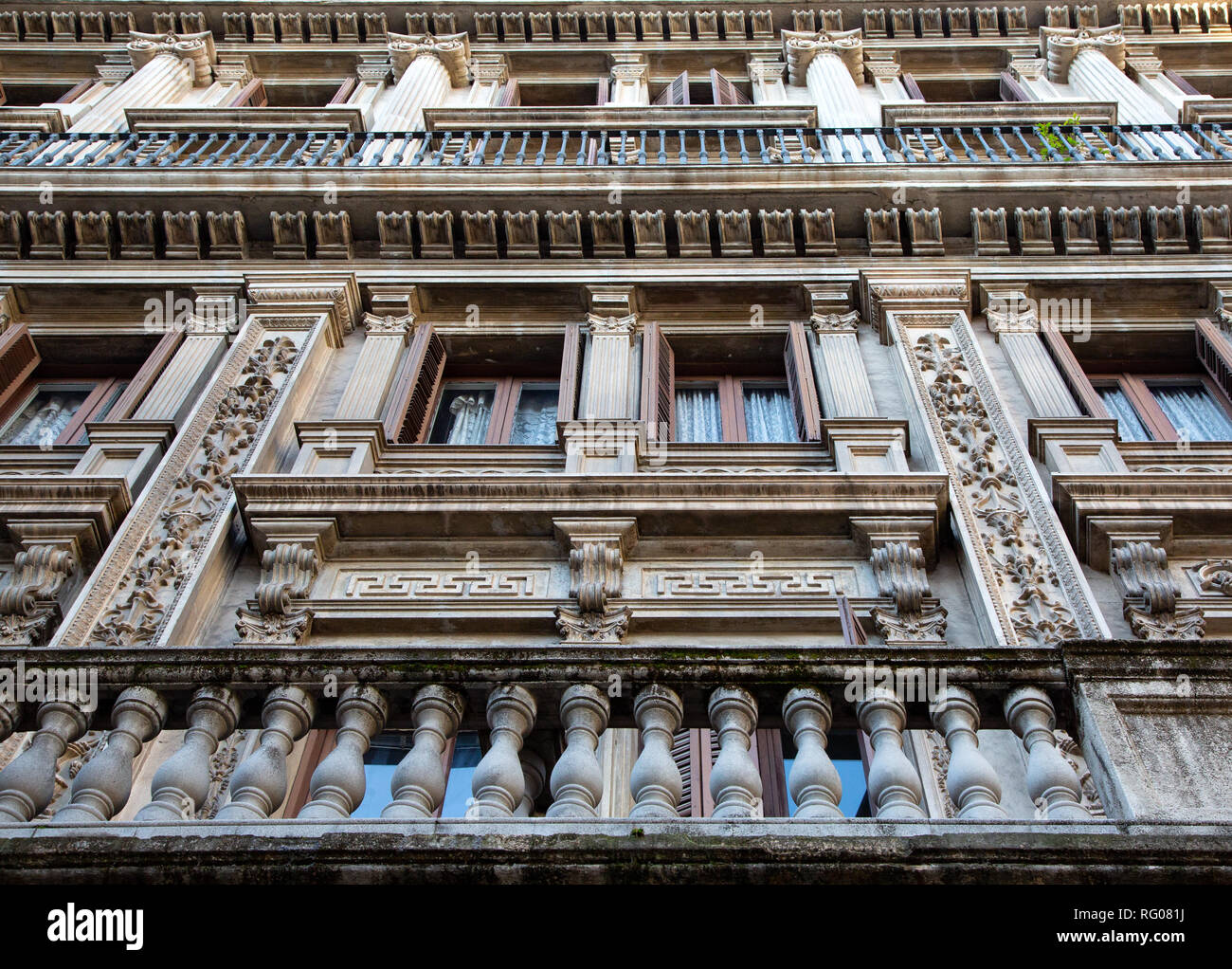 Typical Buildings Typical building facade with balconies in TBarcelona, Spain Stock Photo ...