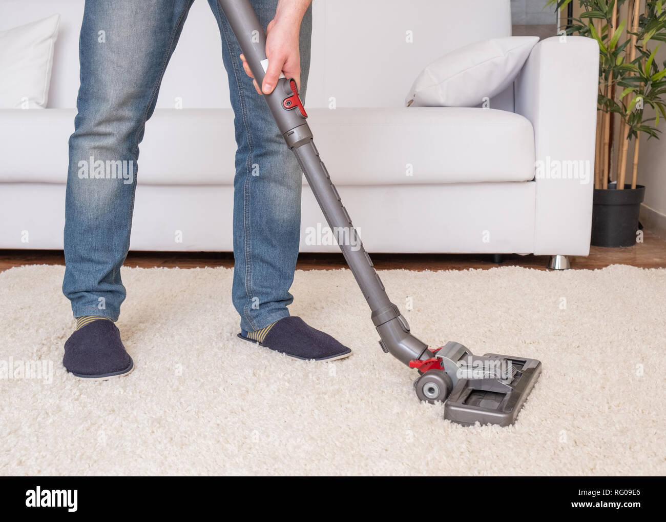 Using vacuum cleaner hi-res stock photography and images - Alamy
