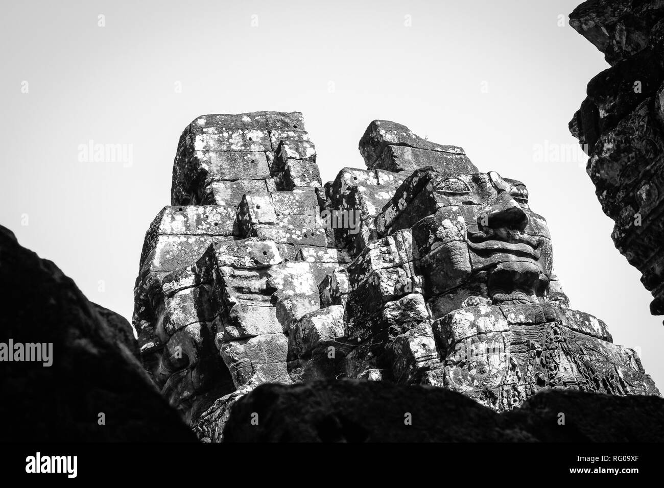 Ancient stone faces of Bayon temple, Cambodia Stock Photo