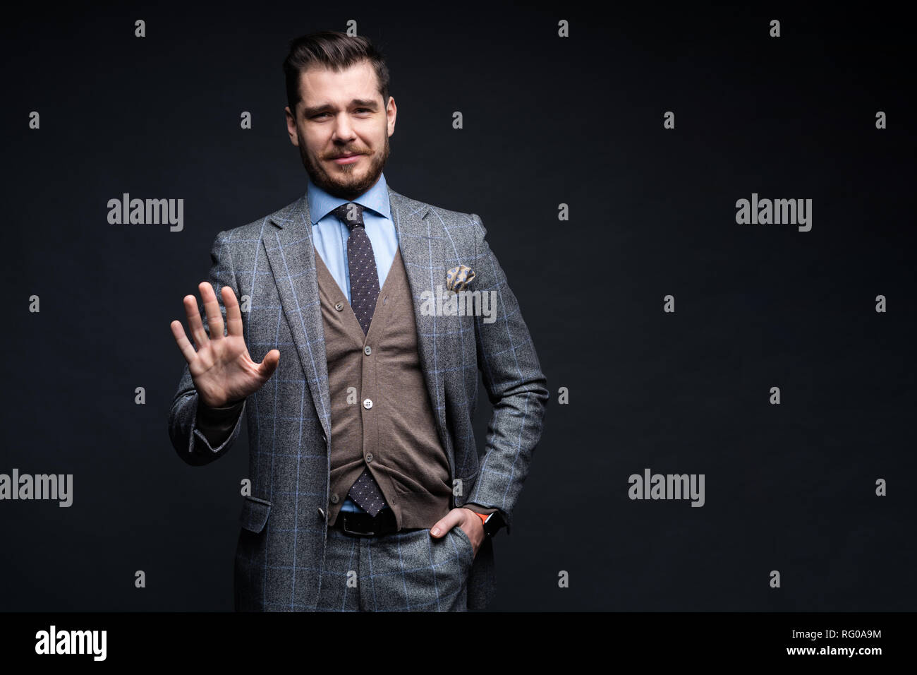 Happy black businessman demonstrating hi-res stock photography and ...