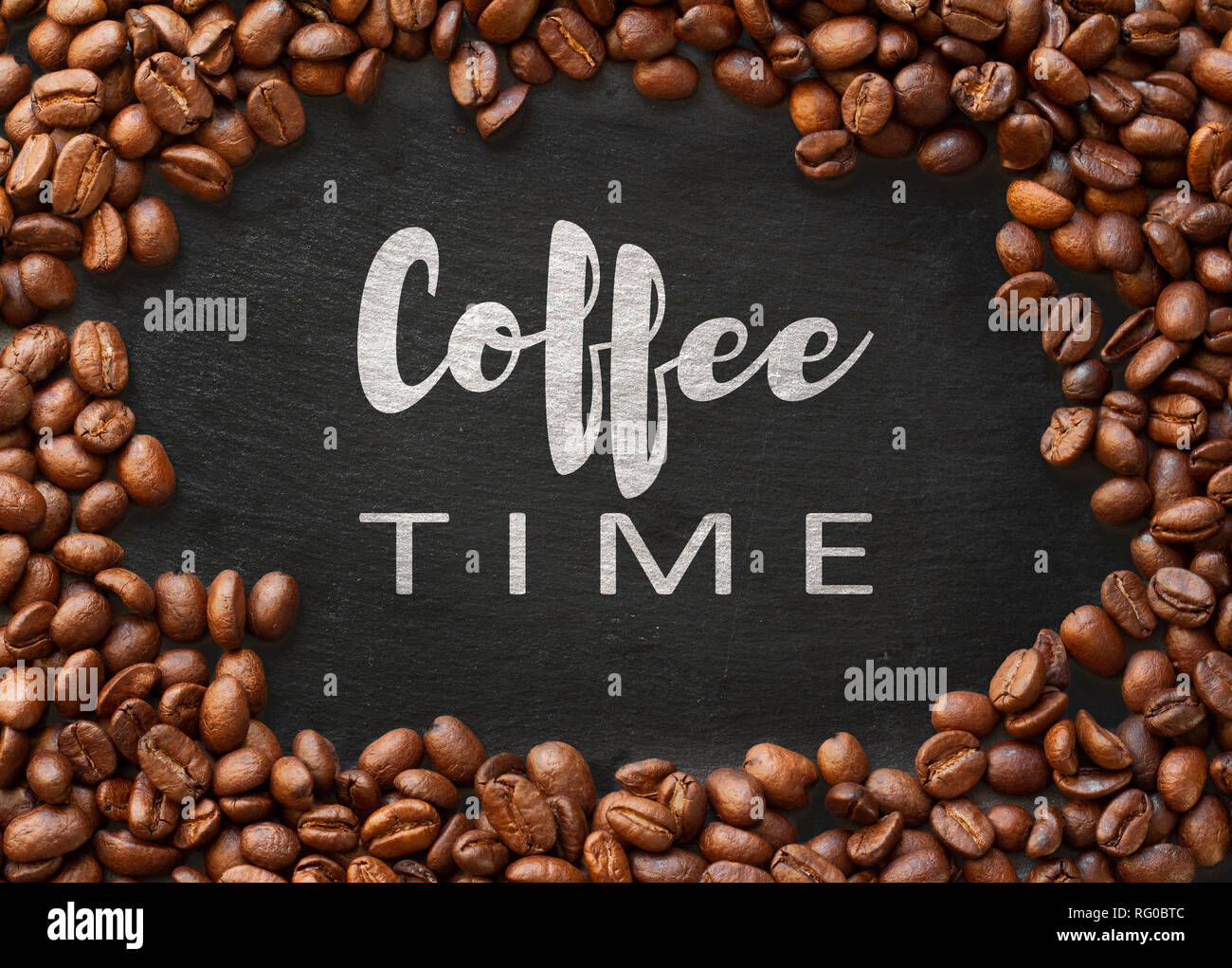 coffee time concept. retro text written inside roasted coffee beans frame. Stock Photo