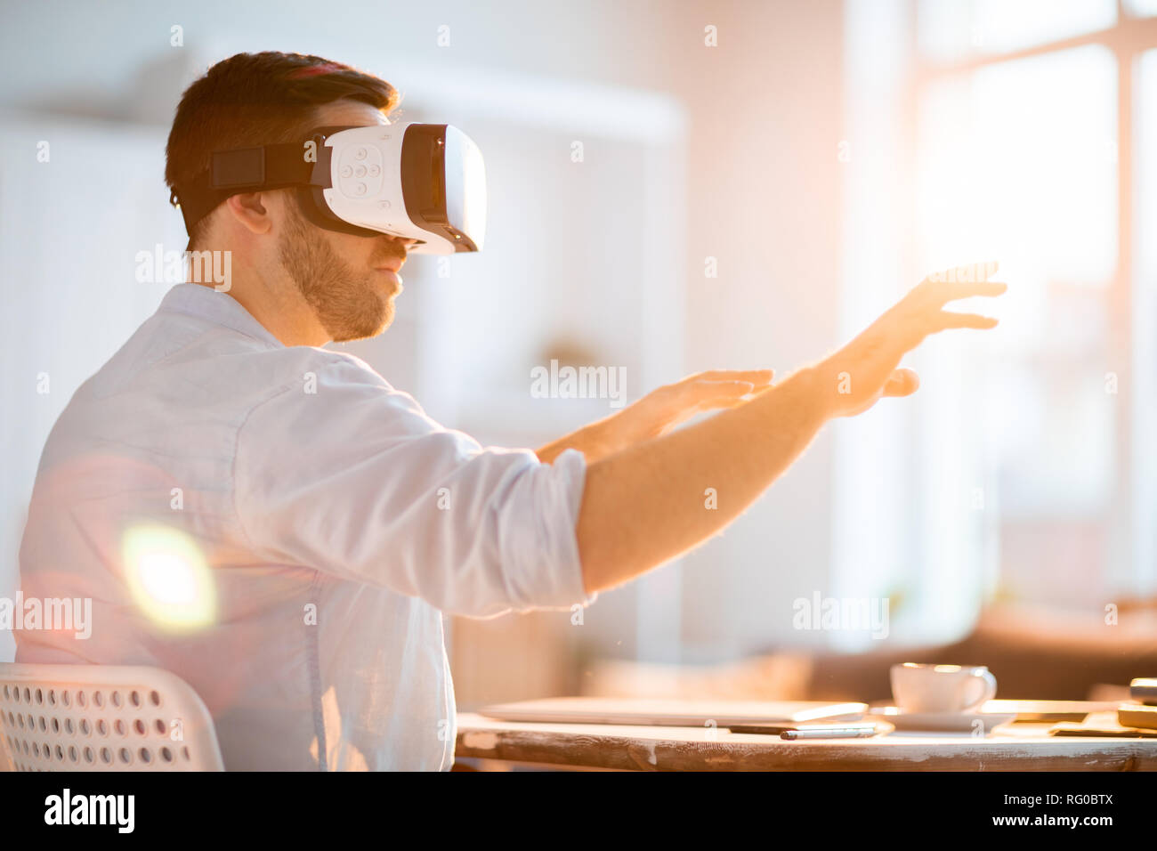 Man in virtual world Stock Photo