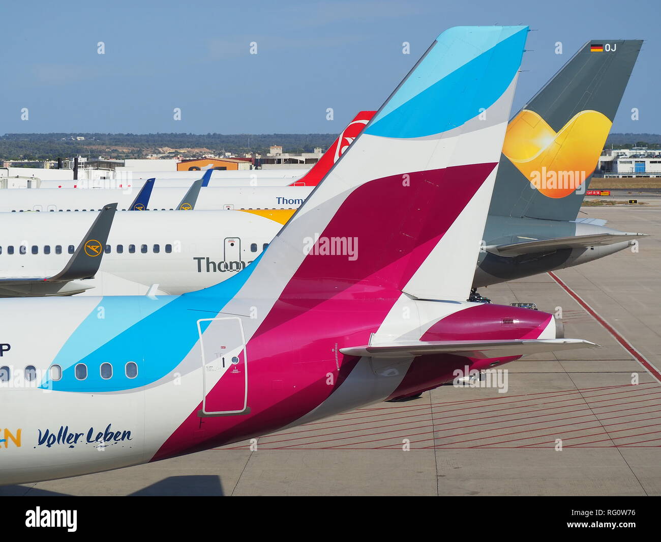 Group of vertical stabilizers of different airlines Stock Photo