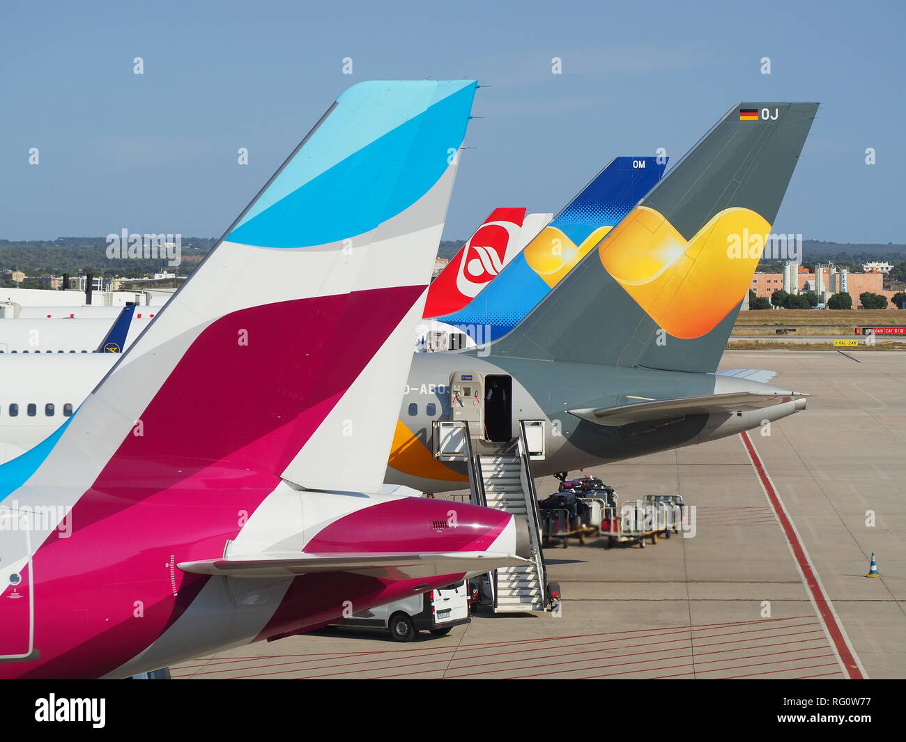 Group of vertical stabilizers of different airlines Stock Photo