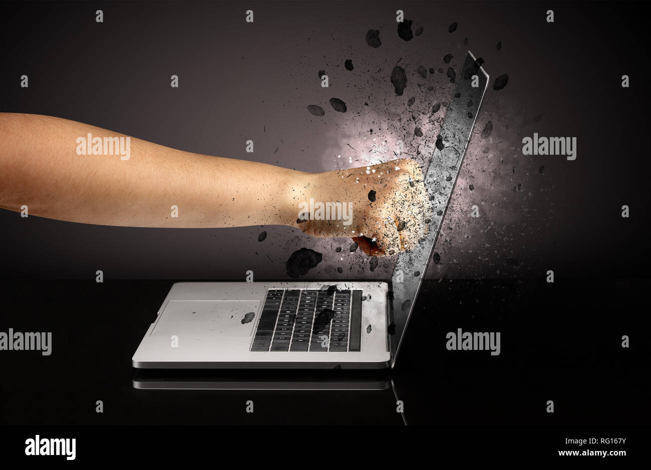 Strong male hand breaks laptop screen glasses Stock Photo - Alamy