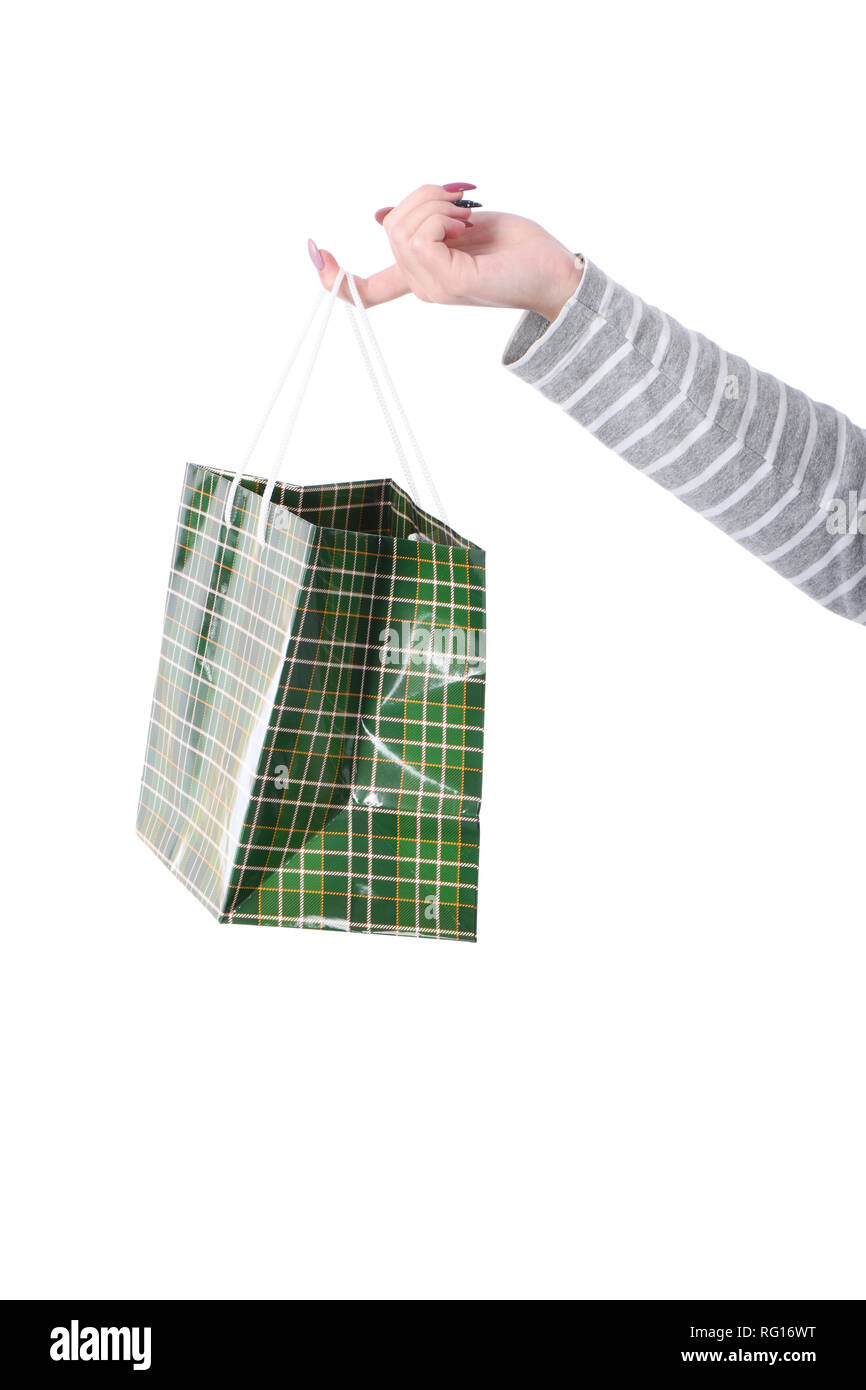 Package in female hand on white background isolation gift Stock Photo ...