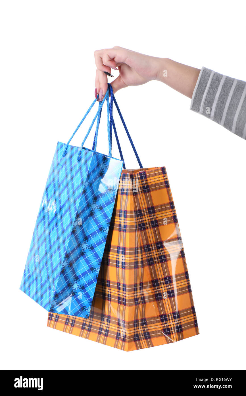 Package in female hand on white background isolation gift Stock Photo ...