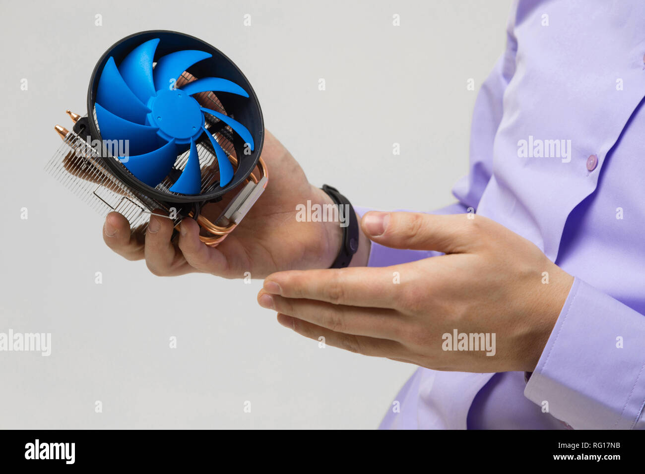 Cooler in men's hands closeup isolated on light background Stock Photo