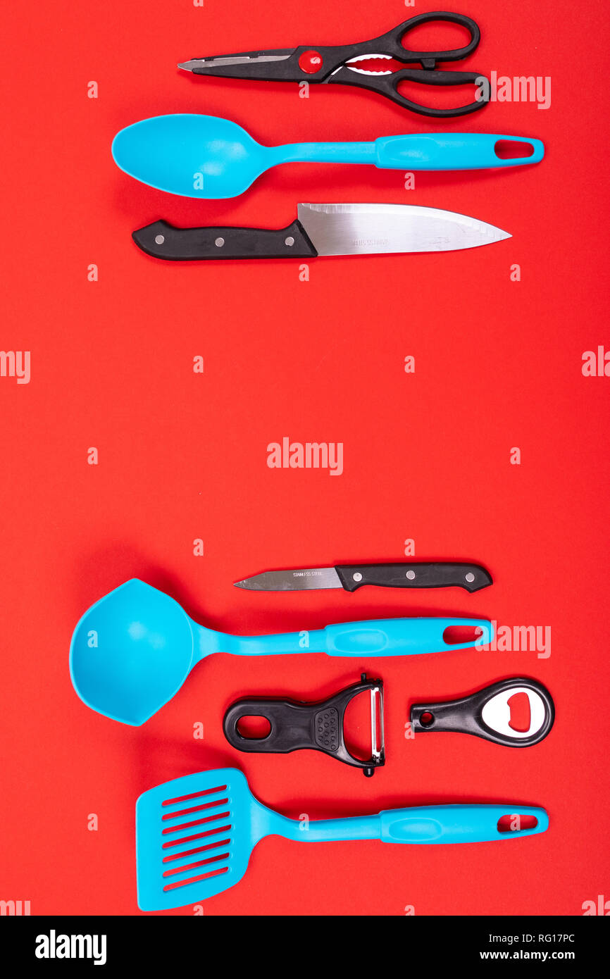 https://c8.alamy.com/comp/RG17PC/top-view-of-stylish-kitchen-utensils-isolated-on-red-background-RG17PC.jpg