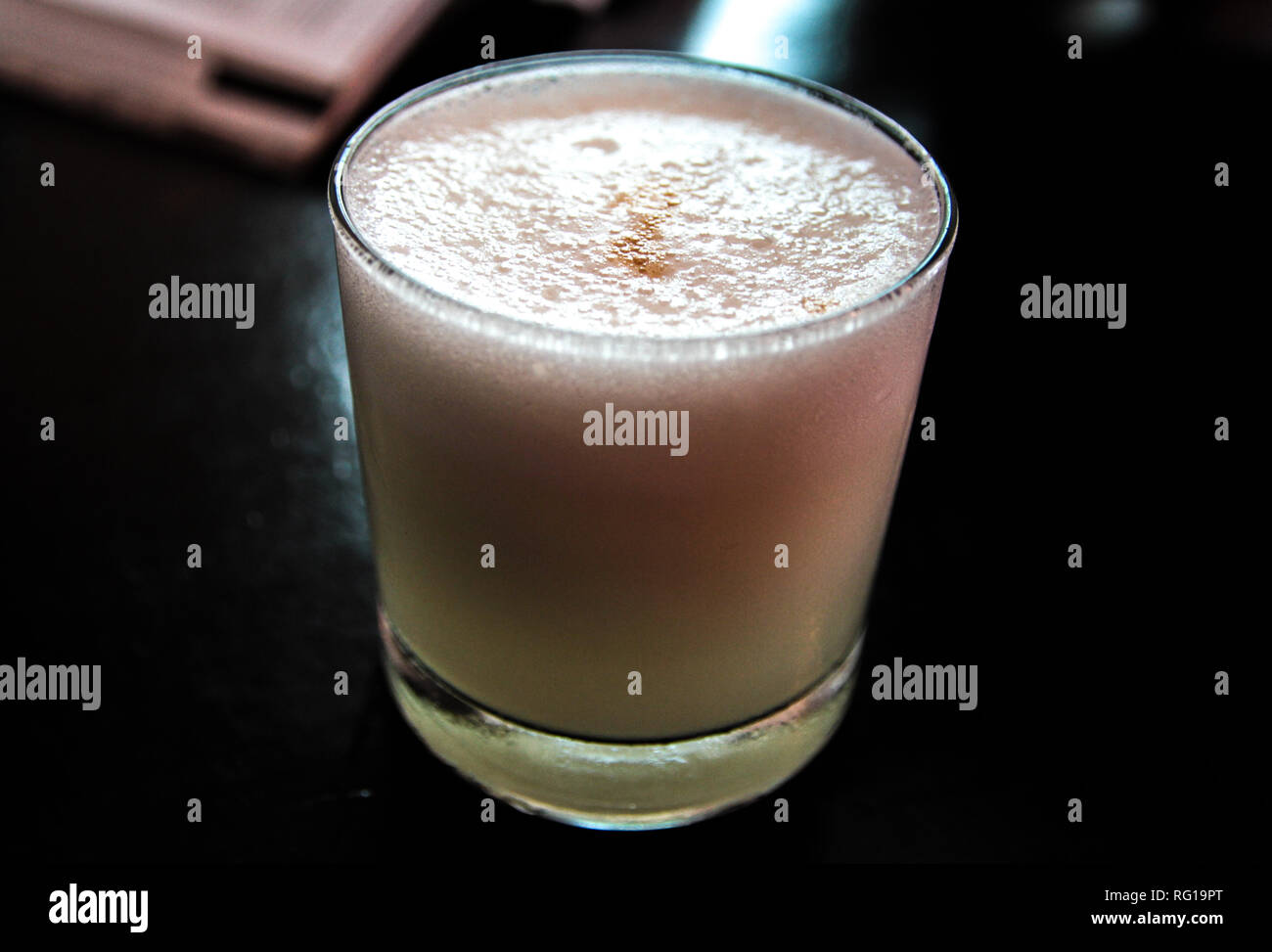 Pisco sour, the most famous cocktail of Peru, made of pisco, eggwhite and angostura Stock Photo