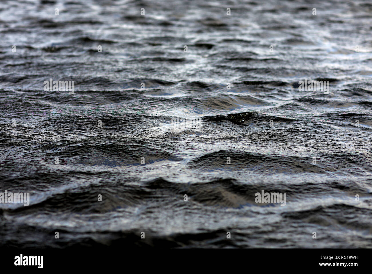 Flood water floodwater in the UK. Generic photograph of floodwater waves Stock Photo