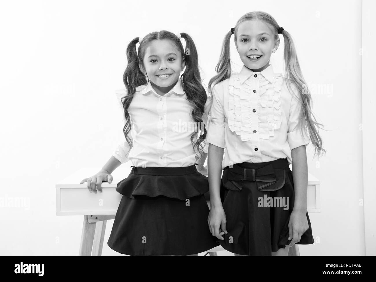 Example to follow. Schoolgirls with cute pony tails hairstyle. Best