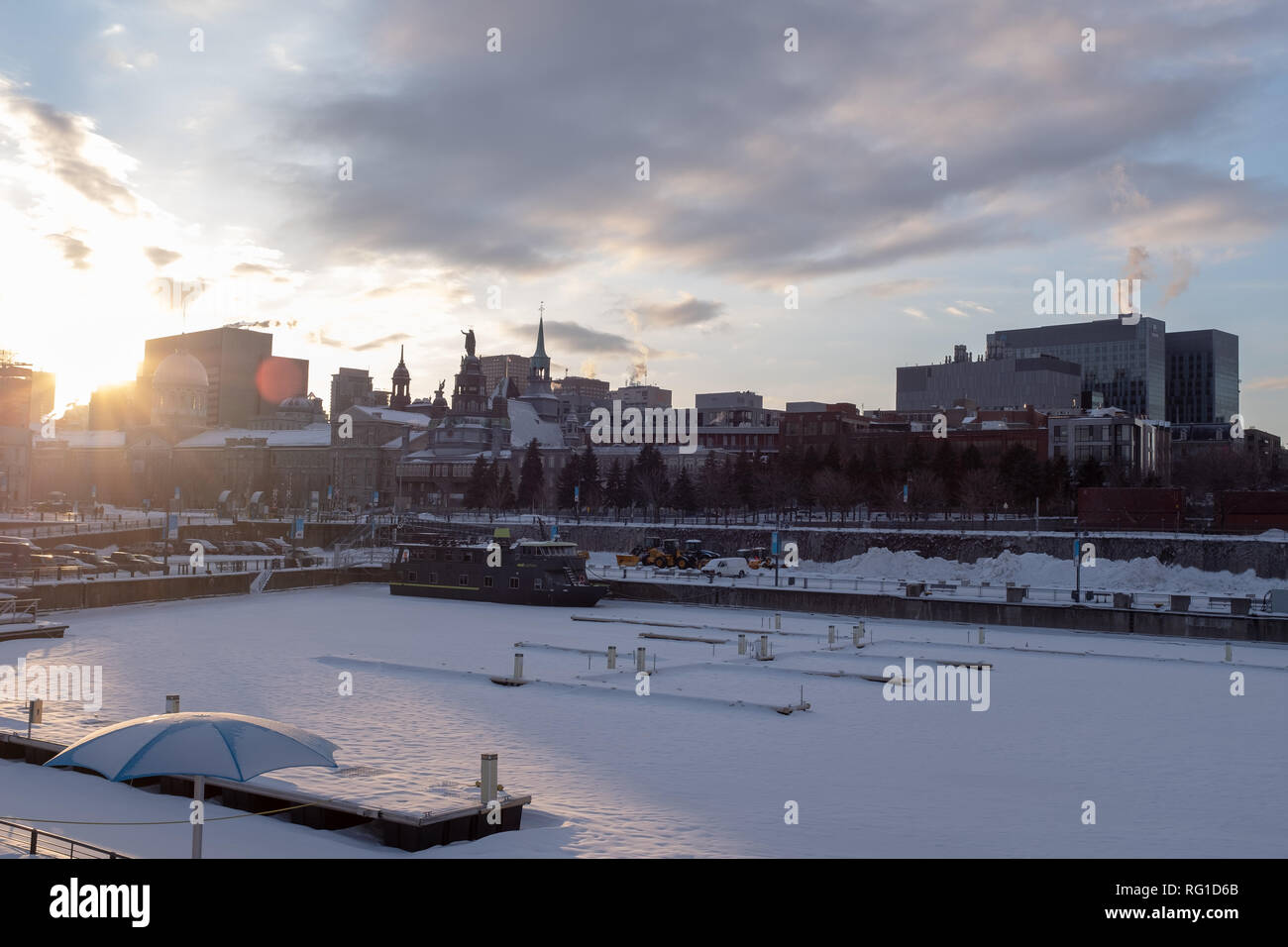 Late winter afternoon sun shining on the Old Port in Montreal Stock Photo