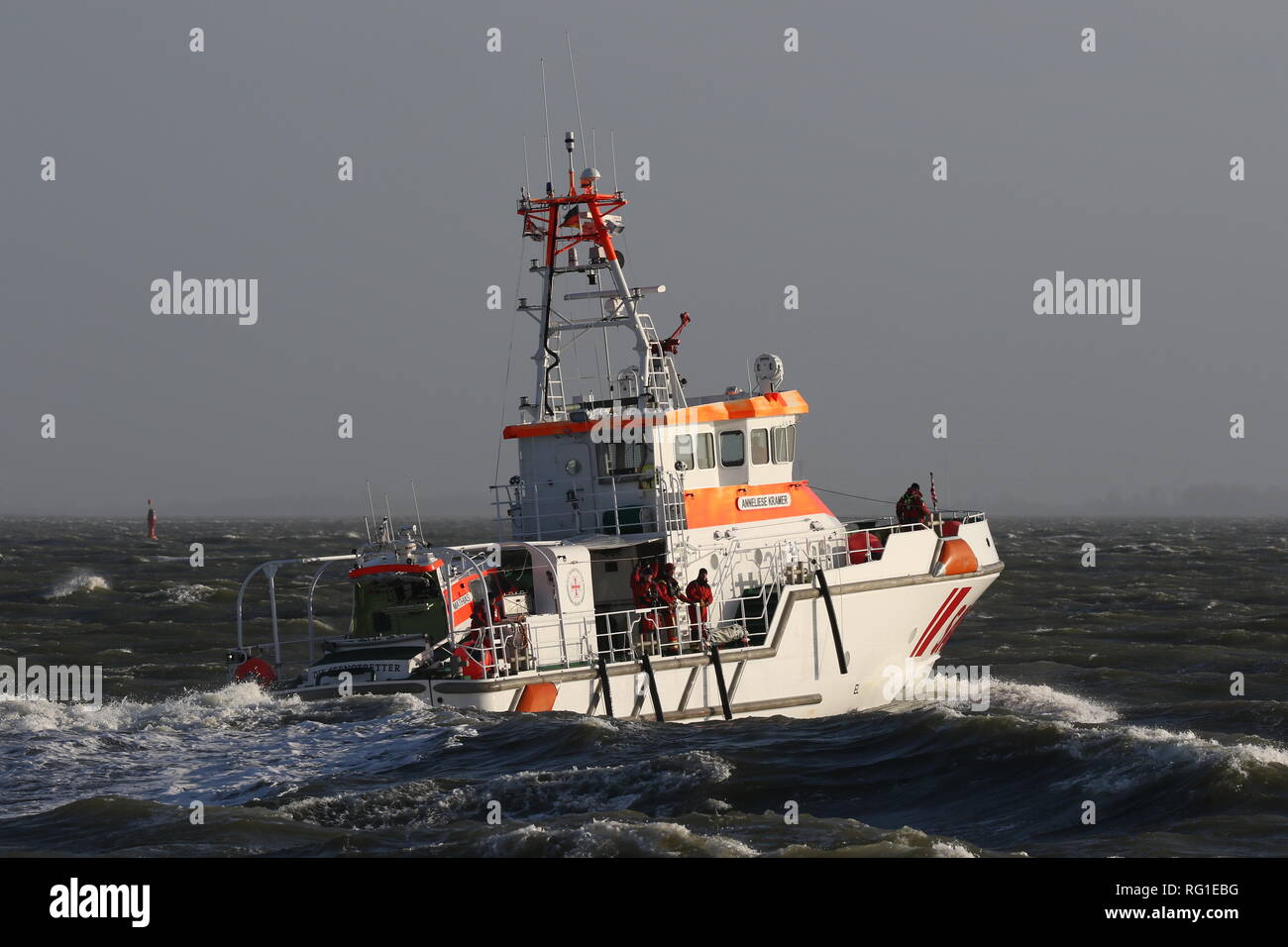 The SAR ship Anneliese Kramer passes on January 1, 2019 the port of Cuxhaven in a stormy sea. Stock Photo