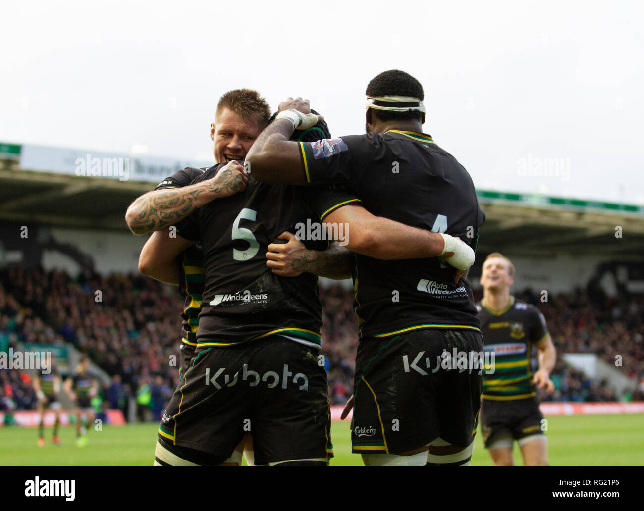 Northampton, UK. 26th January 2019. Teimana Harrison, Dominic Barrow and Api Ratuniyarawa celebrate of Northampton Saints celebrate a try during the Premiership Rugby Cup match between Northampton Saints and Leicester Tigers. Andrew Taylor/Alamy Live News Stock Photo