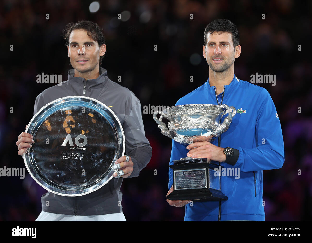 Melbourne, Australia. 27th Jan, 2019. Novak Djokovic (R) of Serbia and  Rafael Nadal of Spain react during the trophy awarding ceremony after the  men's singles final match at 2019 Australian Open in