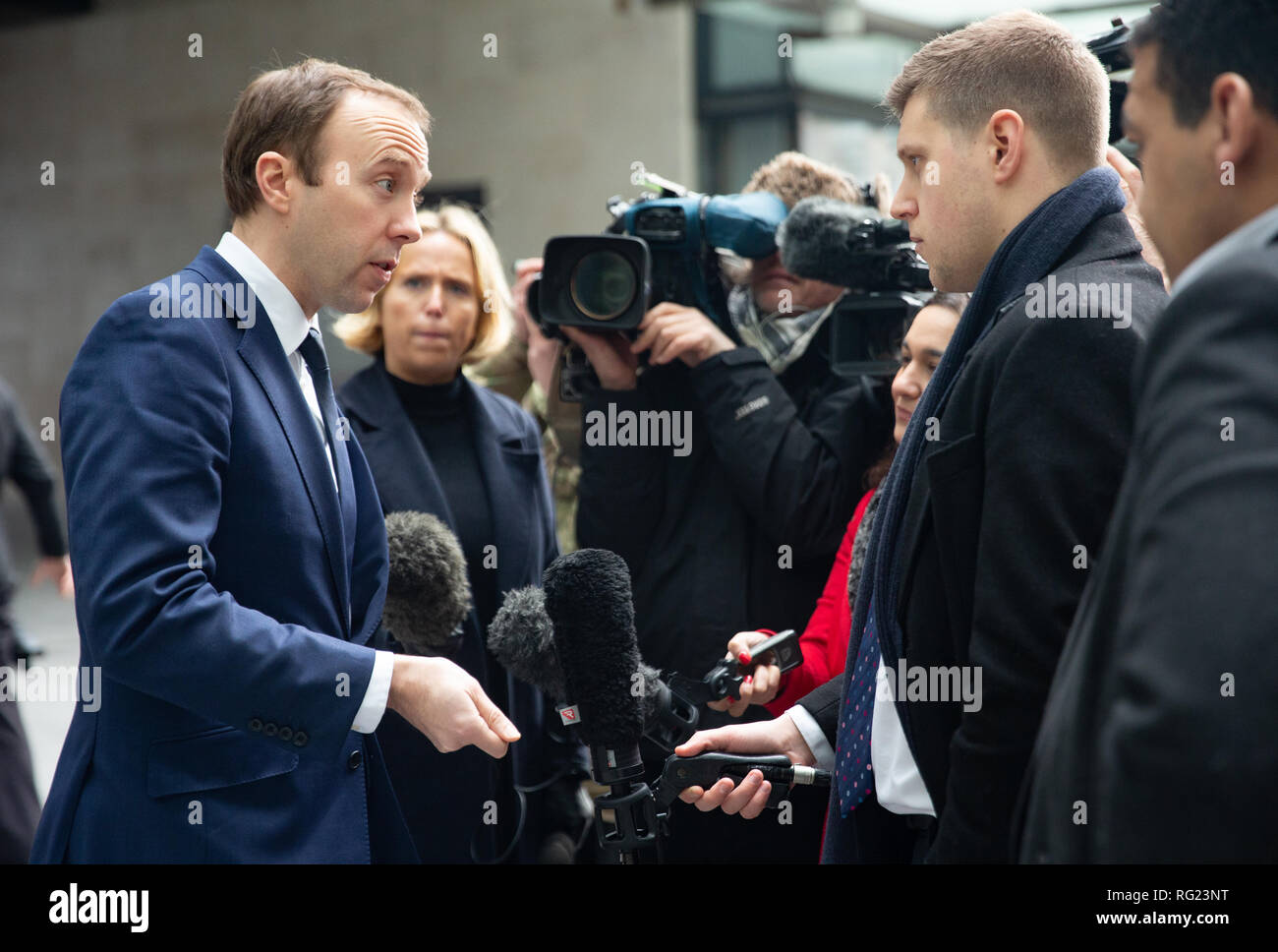 London, UK. 27th January, 2019. Matthew Hancock, Secretary of State for Health and Social care, speaks to the waiting media after appearing on the Andrew Marr Television Show at the BBC Studios. He said that the Government have not ruled out banning social media fims if they fail to remove content that promotes self-harm and suicide. Credit: Tommy London/Alamy Live News Stock Photo