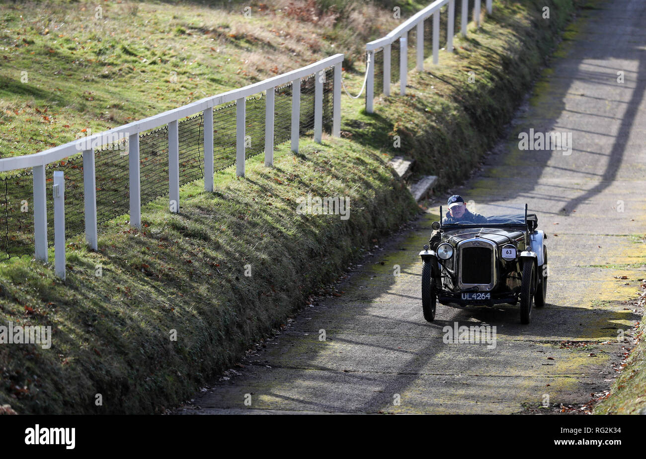A competitor in their 1930 Austin 7, takes on the 'Test Hill' as they take part in the Vintage Sports-Car Club's annual driving tests at the Brooklands Museum in Weybridge, Surrey. Stock Photo