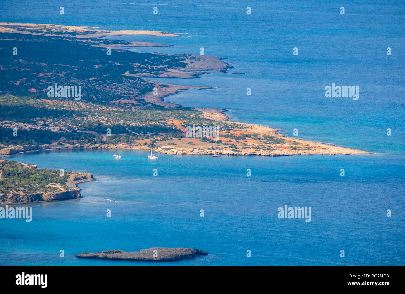 Aerial view of bays and the blue lagoon with turquoise water in the Mediterranean Sea as seen from Aphrodite hiking trail in Akamas peninsula, Cyprus Stock Photo