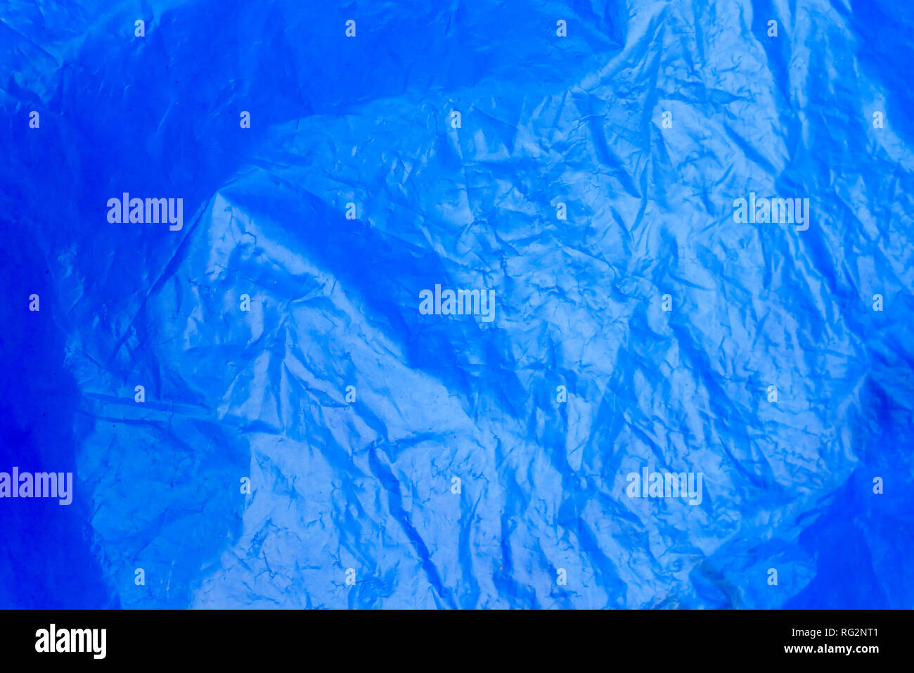 Abstract background crumpled plastic film texture blue garbage bag Stock Photo