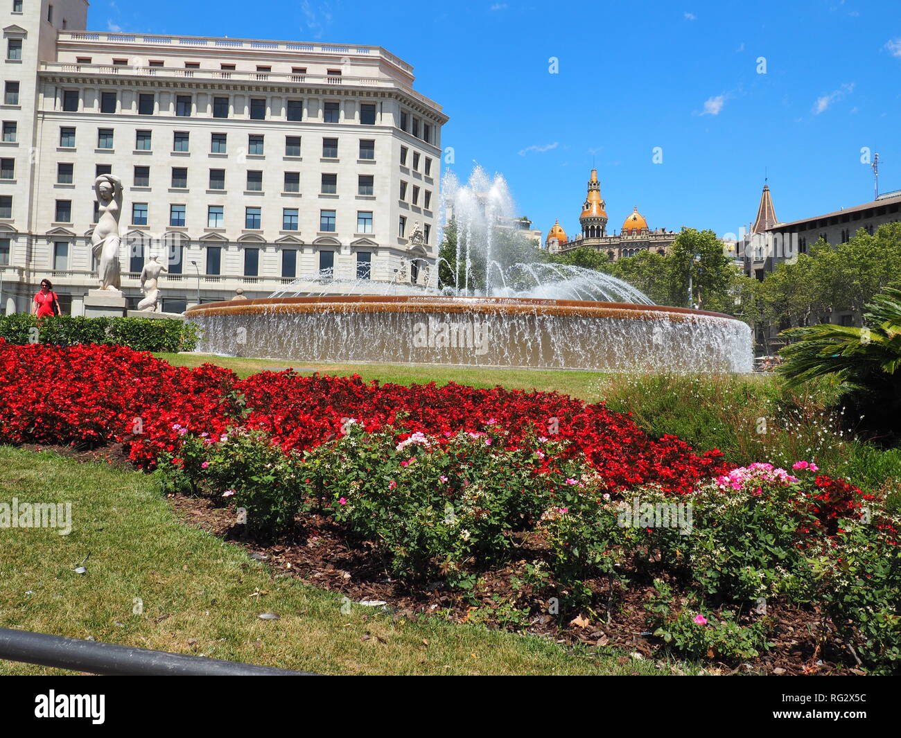 Flowers and Fountain in Plaza Catalunya - Barcelona - Spain Stock Photo
